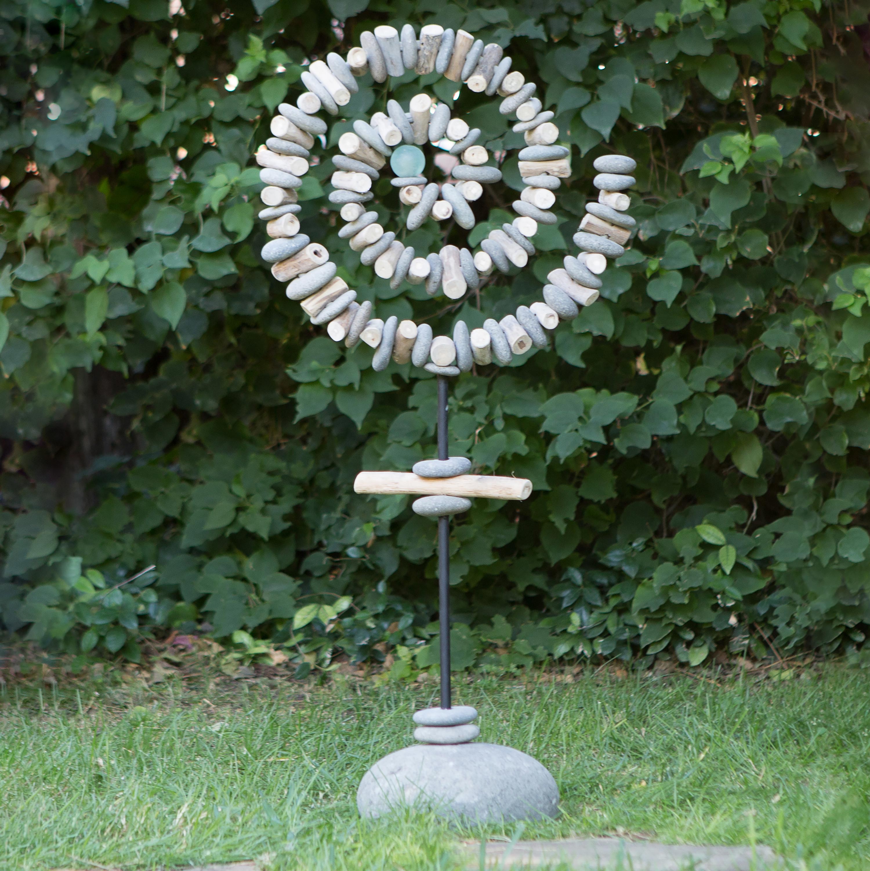 Stone Spiral Garden Sculpture with Glass Sphere